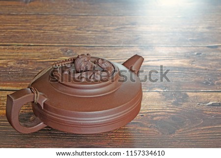 Chinese Teapot on wooden table 