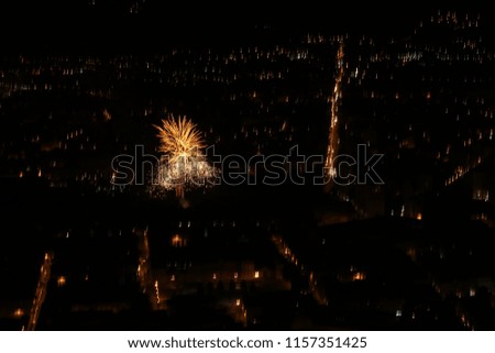 Fireworks over the city of Grenoble during the 14th of July to celebrate the Bastille Day (national day of France)