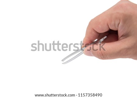 Close up of man's hand holding an tweezers.