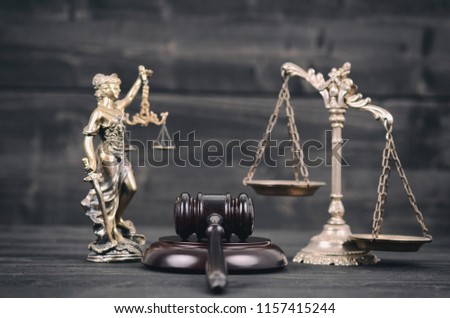 Law and Justice, Legality concept, Lady Justice, Scales of Justice and Judge Gavel on a black wooden background.
