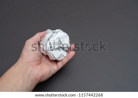White paper over black background