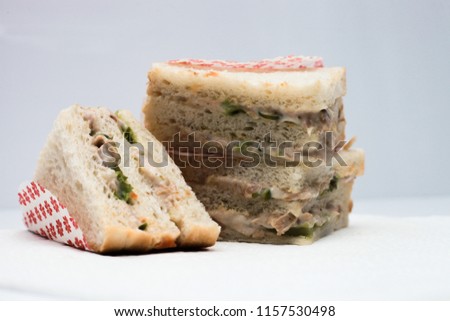 Delicious Malaysian style tuna salad sandwich with salad, tuna and cream cheese with white background