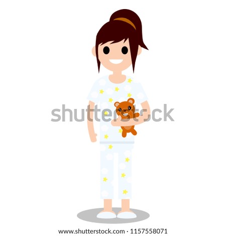 Little girl in pajamas with a Teddy bear. A toy in the hands of a child. Preparation for sleep. Evening rest
