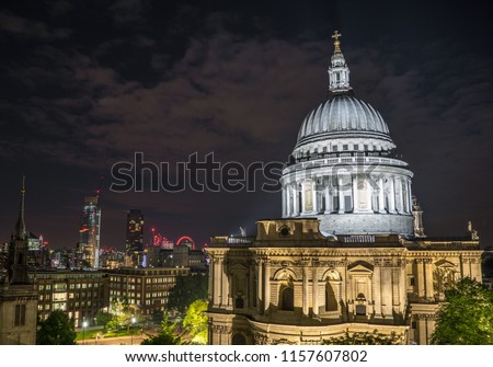 St Paul’s Cathedral at night with the London skyline in the background