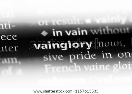 vainglory word in a dictionary. vainglory concept. Royalty-Free Stock Photo #1157613535