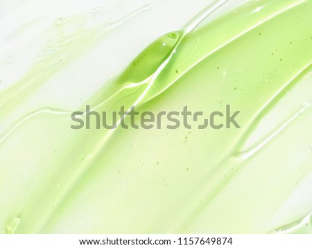 Aloe Vera gel smudge on a white background Royalty-Free Stock Photo #1157649874