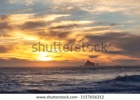 Beautiful sunset in the Pacific Northwest. Sea stacks off the shore of Olympic National Park. 