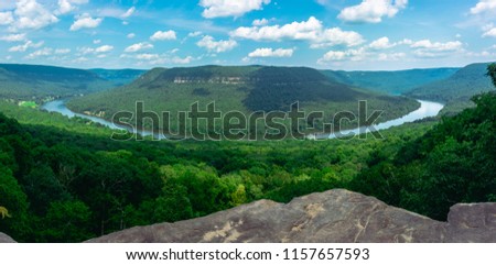 Panoramic shot of the Tennessee River flowing through the valley taken from Snoopers Rock in prentice cooper state forest. Beautiful landscape and typical eastern tennessee. Royalty-Free Stock Photo #1157657593