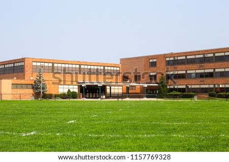 View of typical American school building exterior  Royalty-Free Stock Photo #1157769328