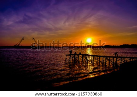 enjoy the sunset on the beach in the summer