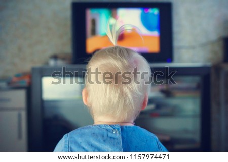 baby watching cartoon. children and TV