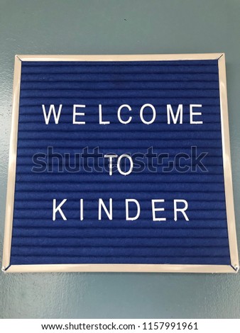 Sign on classroom door welcoming students to Kindergarten.