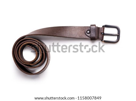 twisted brown male leather belt isolated on a white background Royalty-Free Stock Photo #1158007849