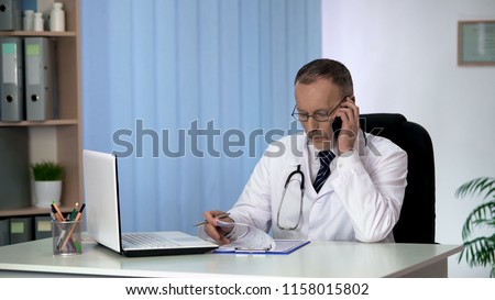Doctor consulting patient in phone conversation professional healthcare services