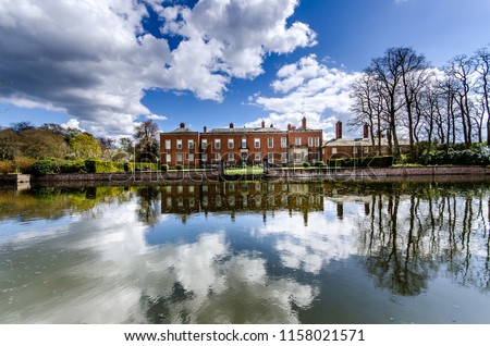 Stunning landscape of Dunham Massey, old historical stately home near Manchester, the National Trust, national parks, NT Royalty-Free Stock Photo #1158021571