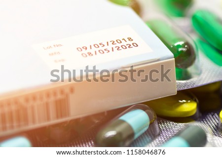 Manufacturing date and expiry date on some pharmaceutical packaging. Royalty-Free Stock Photo #1158046876