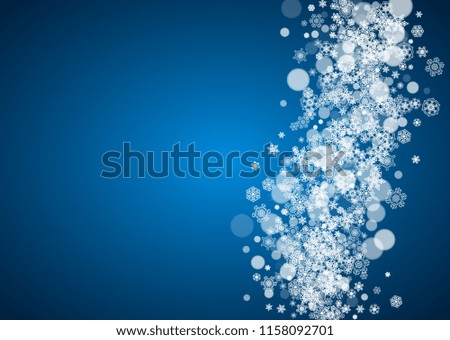 New Year snowflakes on blue background. Horizontal winter theme. Christmas and New Year snowflakes falling. For season sales, special offer, banners, cards, party invites, flyers. White frosty snow