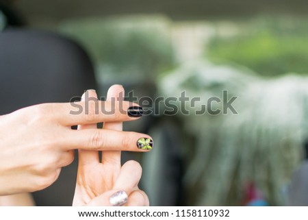 The hashtag sign is composed of male and female fingers.