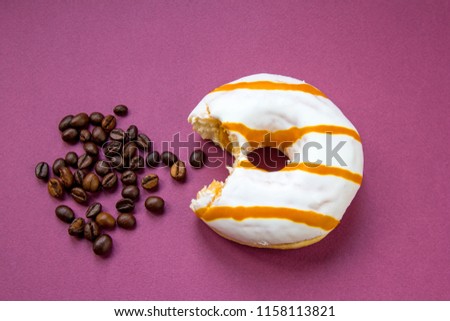 Pac man style picture: donut and coffee beans at bright colorful background