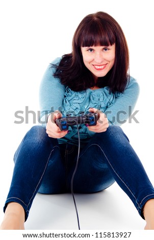 beautiful girl happy, playing video games isolated on white background