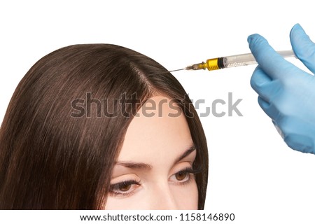 platelet rich plasma. Isolated white background. cosmetology hair injection. Royalty-Free Stock Photo #1158146890