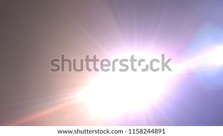 Abstract Natural lens flare ,Sun flare on the black background.