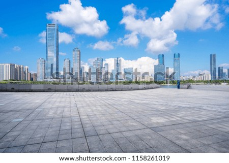 empty square with city skyline in shenzhen china