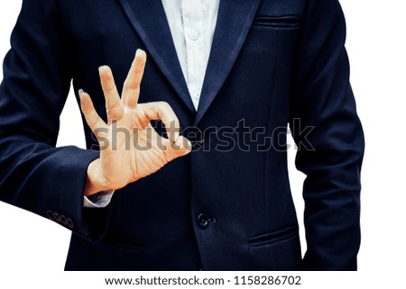 Businessman raising his hand OK