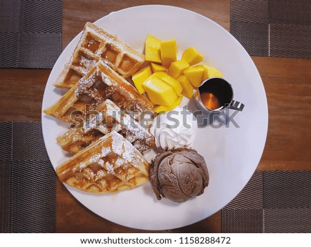 High Angle View of Waffle Chocolate Ice Cream with Honey Syrup