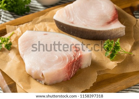 Raw Organic Swordfish Steak Filets Ready to Cook Royalty-Free Stock Photo #1158397318