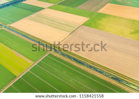 Aerial photography of Dutch agriculture fields, wind turbines, infrastructure and landscapes 