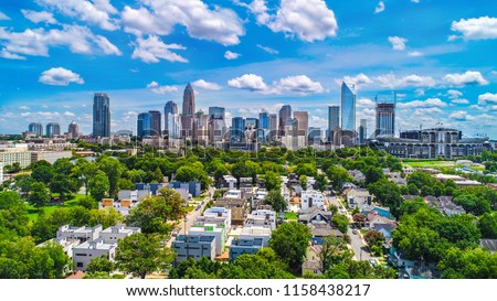 Drone Aerial of Downtown Charlotte, North Carolina, NC, USA Skyline. Royalty-Free Stock Photo #1158438217