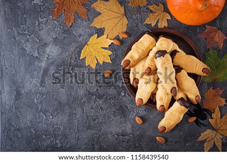 Cookies witch fingers, funny recipe for Halloween party. Top view. Flat lay