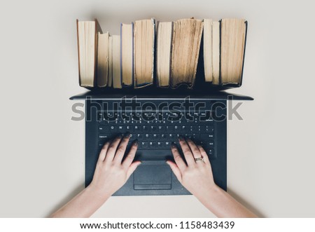 Creative concept of book and ebook Royalty-Free Stock Photo #1158483439