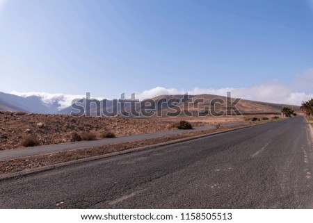 Road in the middle of the desert in Fuerteventura, Spain