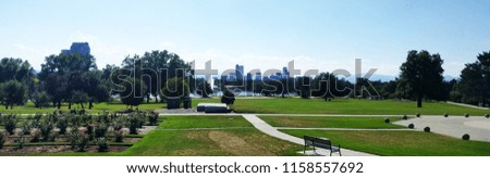 A panoramic city view of Denver, Colorado on a summer day. 