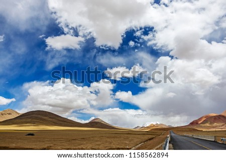 Dangerous mountain road at Ladakh India with view of scenic landscape and Himalayan mountain ranges.