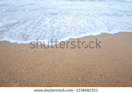 Beautiful sea and wave on sandy beach. Concept of this picture is to think of the sea on a happy holiday.