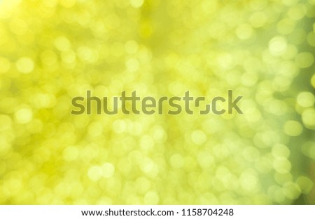 Abstract green bokeh circles for Christmas background. Royalty high-quality free stock photo of Christmas light overlay background. Holiday glowing backdrop. Defocused background with blinking stars
