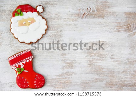 Christmas and New Year background with gingerbreads as festive decorations