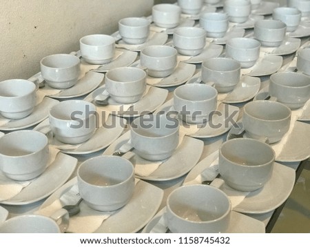 close up row of white cup of coffee