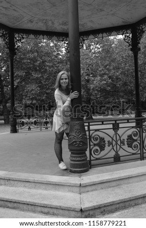 Woman  on Victorian bandstand