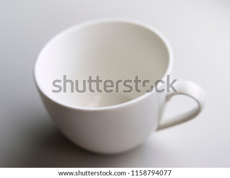 a cup of coffee on white background