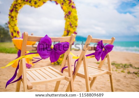 Romantic colorful wedding setting on a beautiful tropical beach.