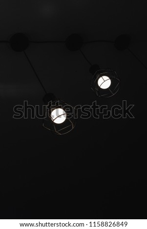 Abstract white light vintage lamp with dark background