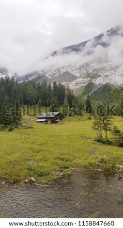 
a hut in the beautiful and quiet nature in the swiss alps.