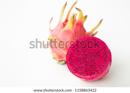Fresh pitahaya fruit sliced on white background or ripe dragon fruit red color with copy-space design for drinks package design, healthy article picture and plantation guide book design.