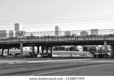 Bridges cross an expressway in downtown Houston, Texas.