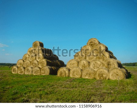 pyramid of bales of hay	                 
