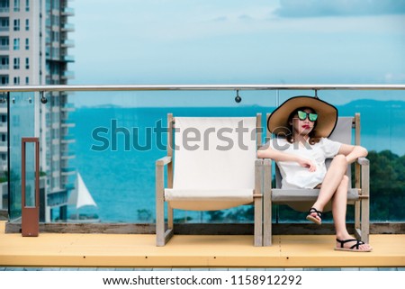 Portrait Of A Beautiful Young Woman On Vacation.